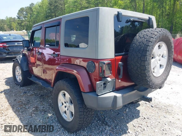 2007 Jeep Wrangler Unlimited Sahara with VIN 1J4GA59187L116585, listed as a IAAI auction lot 41996297 with 151,961 mi miles and . Bid and sale history available at DreamBid. Image 3.