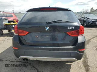 2014 BMW X1 xDrive28i z VIN WBAVL1C5XEVY20300, wystawiony jako Copart lot #51334275 z przebiegiem 175 652 mil mil oraz Tytuł czysty. Historia ofert i sprzedaży dostępna na DreamBid. Obrazek 6.