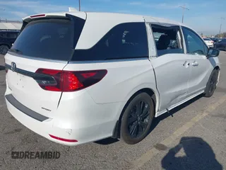 2023 Honda Odyssey Sport z VIN 5FNRL6H77PB011088, wystawiony jako IAAI lot #41883596 z przebiegiem 80 528 mil mil oraz . Historia ofert i sprzedaży dostępna na DreamBid. Obrazek 4.