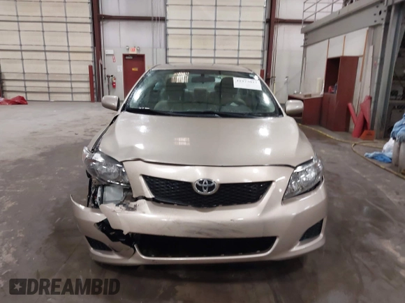 2009 Toyota Corolla with VIN 1NXBU40E19Z014460, listed as a IAAI auction lot 41973023 with 74,927 mi miles. Bid and sale history available at carsss.com. Image 12.