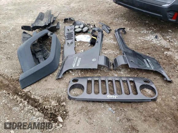 2018 Jeep Wrangler Unlimited Sport S with VIN 1C4BJWDG8JL814090, listed as a Copart auction lot 49155145 with 74,875 mi miles and Salvage Title. Bid and sale history available at DreamBid. Image 12.
