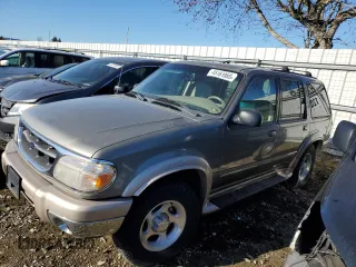 2000 Ford Explorer Eddie Bauer z VIN 1FMZU74E3YZB45594, wystawiony jako Copart lot #45161085 z przebiegiem 185 791 mil mil oraz Czysty tytuł • Clean title. Historia ofert i sprzedaży dostępna na DreamBid. Obrazek 1.