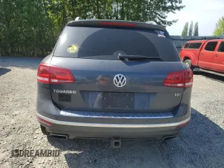 2015 Volkswagen Touareg Lux z VIN WVGEP9BP0FD006992, wystawiony jako Copart lot #59524445 z przebiegiem 169 822 mil mil oraz Szkoda całkowita • Salvage title. Historia ofert i sprzedaży dostępna na DreamBid. Obrazek 6.