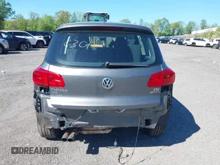2017 Volkswagen Tiguan S with VIN WVGBV7AX9HK049420, listed as a IAAI auction lot 41838301 with 118,490 mi miles and . Bid and sale history available at DreamBid. Image 16.