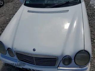 1999 Mercedes-Benz E-Class with VIN WDBJF65H0XA877630, listed as a Copart auction lot 69697454 with 0 mi miles and Salvage Title. Bid and sale history available at carsss.com. Image 13.