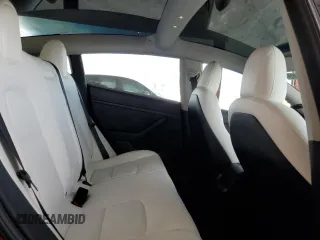 2022 Tesla Model 3 with VIN 5YJ3E1EA0NF329568, listed as a Copart auction lot 52594205 with 27,446 mi miles and Non Repairable. Bid and sale history available at carsss.com. Image 10.