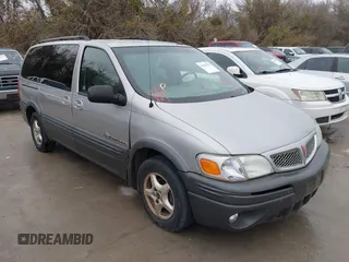2004 Pontiac Montana 1SA with VIN 1GMDX03E54D147588, listed as a IAAI auction lot 41302755 with Not Provided miles and . Bid and sale history available at DreamBid. Image 1.