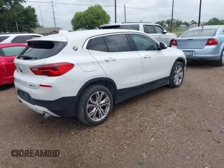 2018 BMW X2 sDrive28i with VIN WBXYJ3C33JEJ84753, listed as a IAAI auction lot 42660237 with 62,496 mi miles and . Bid and sale history available at DreamBid. Image 4.