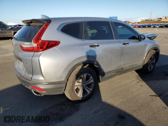 2018 Honda CR-V LX z VIN 2HKRW6H3XJH203604, wystawiony jako Copart lot #89002705 z przebiegiem 77 628 mil mil oraz Szkoda całkowita • Salvage title. Historia ofert i sprzedaży dostępna na DreamBid. Obrazek 3.