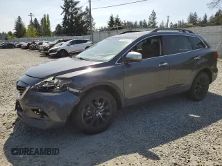 2014 Mazda CX-9 Grand Touring with VIN JM3TB3DV9E0439565, listed as a Copart auction lot 54515375 with 83,157 mi miles and Salvage Title. Bid and sale history available at DreamBid. Image 1.