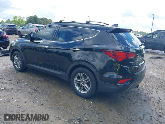 2017 Hyundai Santa Fe 2.4L z VIN 5NMZU3LB5HH043545, wystawiony jako IAAI lot #42244550 z przebiegiem 84 464 mil mil oraz . Historia ofert i sprzedaży dostępna na DreamBid. Obrazek 3.