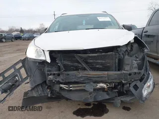 2012 Chevrolet Traverse LS z VIN 1GNKREED8CJ373705, wystawiony jako IAAI lot #41172553 z przebiegiem 101 410 mil mil oraz . Historia ofert i sprzedaży dostępna na DreamBid. Obrazek 13.