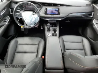 2020 Cadillac XT4 AWD Sport z VIN 1GYFZFR47LF088467, wystawiony jako Copart lot #69901024 z przebiegiem 46 701 mil mil oraz Szkoda całkowita • Salvage title. Historia ofert i sprzedaży dostępna na DreamBid. Obrazek 8.