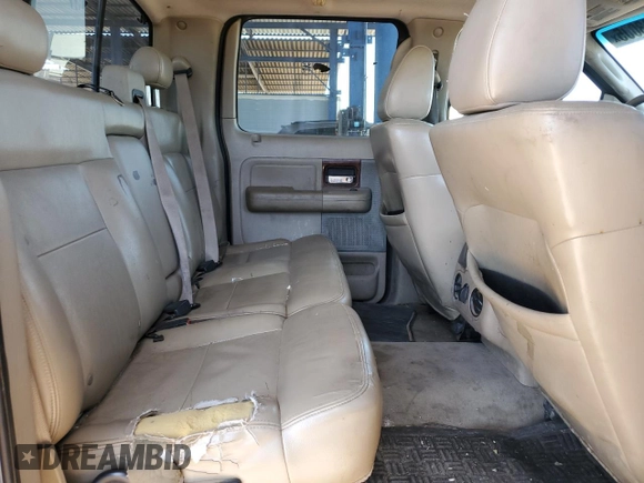 2005 Ford F-150 XLT z VIN 1FTPW12565FA07910, wystawiony jako Copart lot #58243005 z przebiegiem 268 744 mil mil oraz Szkoda całkowita • Salvage title. Historia ofert i sprzedaży dostępna na DreamBid. Obrazek 10.
