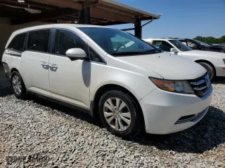 2015 Honda Odyssey EX-L with VIN 5FNRL5H68FB029549, listed as a Copart auction lot 52912935 with 156,103 mi miles and Salvage Title. Bid and sale history available at carsss.com. Image 4.