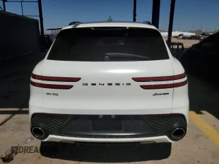 2022 Genesis GV70 Sport z VIN KMUMCDTC7NU038800, wystawiony jako Copart lot #71394474 z przebiegiem 40 933 mil mil oraz Szkoda całkowita • Salvage title. Historia ofert i sprzedaży dostępna na DreamBid. Obrazek 6.