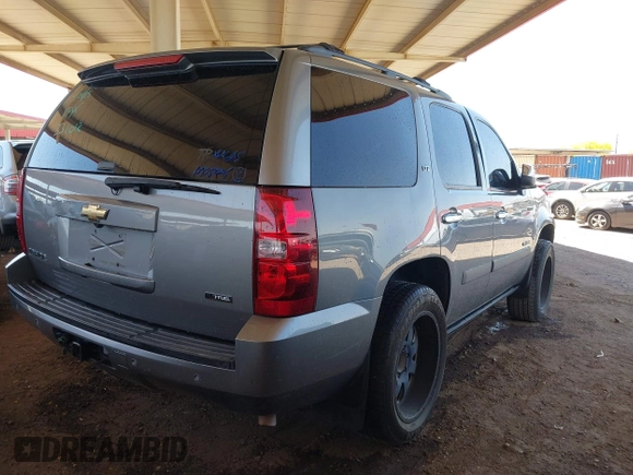 2007 Chevrolet Tahoe LTZ with VIN 1GNFK13037J331012, listed as a IAAI auction lot 42122457 with 111,130 mi miles and . Bid and sale history available at DreamBid. Image 4.