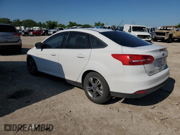 2017 Ford Focus SE with VIN 1FADP3FE8HL284169, listed as a Copart auction lot 61732695 with 70,443 mi miles and Salvage title. Bid and sale history available at DreamBid. Image 2.