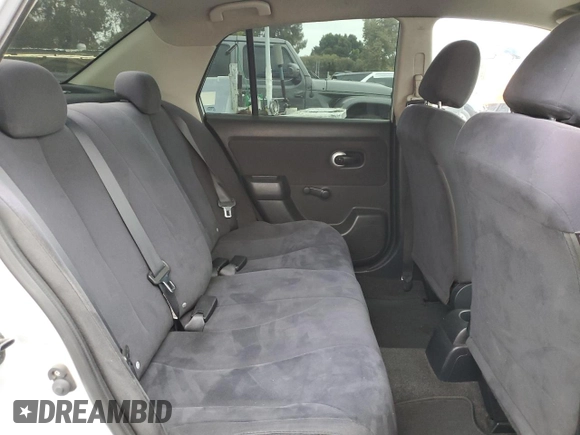 2009 Nissan Versa 1.6 with VIN 3N1CC11E79L429613, listed as a Copart auction lot 72220034 with 134,891 mi miles and Salvage Title. Bid and sale history available at carsss.com. Image 10.