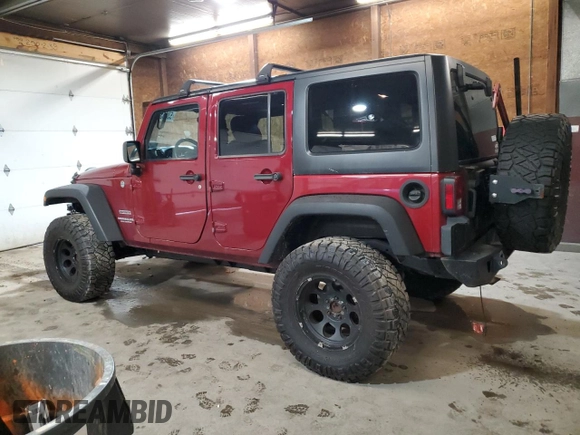 2012 Jeep Wrangler Unlimited Sport z VIN 1C4BJWDG8CL282181, wystawiony jako Copart lot #53863375 z przebiegiem 92 984 mil mil oraz Szkoda całkowita • Salvage title. Historia ofert i sprzedaży dostępna na DreamBid. Obrazek 2.