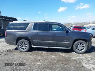 2015 GMC Yukon XL Denali with VIN 1GKS2JKJ5FR144991, listed as a IAAI auction lot 41877853 with 167,814 mi miles. Bid and sale history available at carsss.com. Image 14.