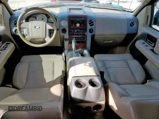 2005 Ford F-150 XLT with VIN 1FTPX12575NB60735, listed as a Copart auction lot 49598075 with 153,360 mi miles and Salvage title. Bid and sale history available at DreamBid. Image 8.