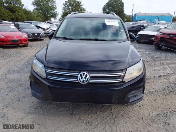 2017 Volkswagen Tiguan Wolfsburg Edition with VIN WVGSV7AX8HK003674, listed as a IAAI auction lot 40476672 with 67,930 mi miles. Bid and sale history available at carsss.com. Image 12.