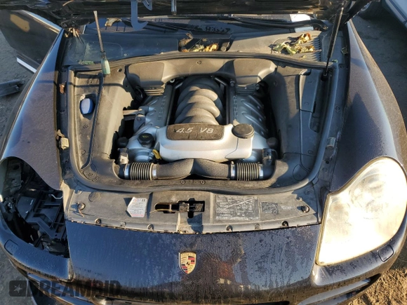 2005 Porsche Cayenne S with VIN WP1AB29P65LA63165, listed as a Copart auction lot 70038744 with 192,060 mi miles and Salvage Title. Bid and sale history available at carsss.com. Image 13.