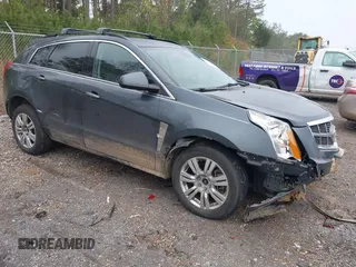 2012 Cadillac SRX with VIN 3GYFNGE31CS640832, listed as a IAAI auction lot 41861023 with 152,138 mi miles. Bid and sale history available at carsss.com. Image 1.