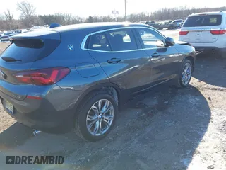 2022 BMW X2 xDrive28i with VIN WBXYJ1C05N5U40472, listed as a IAAI auction lot 41433452 with 67,801 mi miles. Bid and sale history available at carsss.com. Image 4.