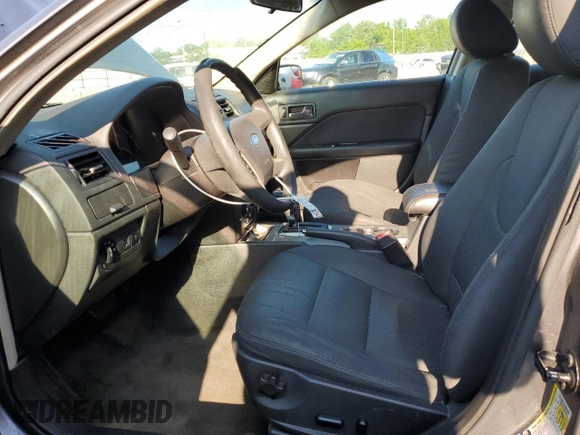 2012 Ford Fusion SE z VIN 3FAHP0HA0CR437115, wystawiony jako Copart lot #56583495 z przebiegiem 159 649 mil mil oraz Szkoda całkowita • Salvage title. Historia ofert i sprzedaży dostępna na DreamBid. Obrazek 7.