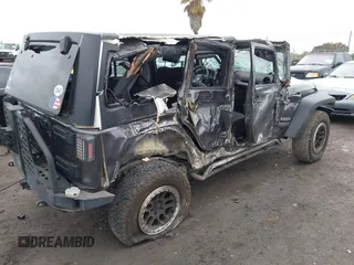2018 Jeep Wrangler JK Unlimited Sport with VIN 1C4BJWDG3JL828513, listed as a IAAI auction lot 41535694 with 160,254 mi miles. Bid and sale history available at carsss.com. Image 4.