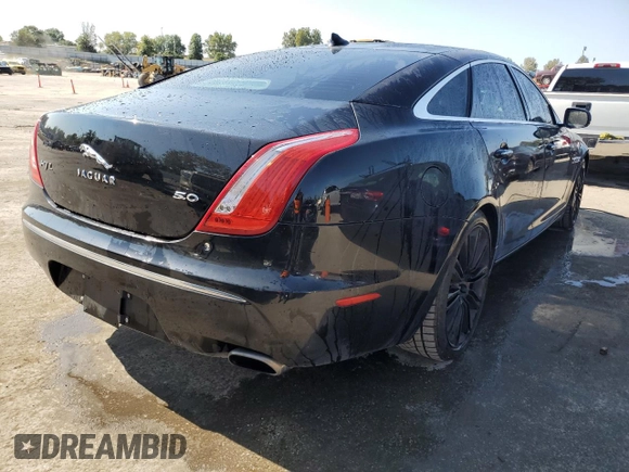 2013 Jaguar XJ Supercharged with VIN SAJWA2GE3DMV42875, listed as a Copart auction lot 71409324 with 129,422 mi miles and Salvage title. Bid and sale history available at DreamBid. Image 3.