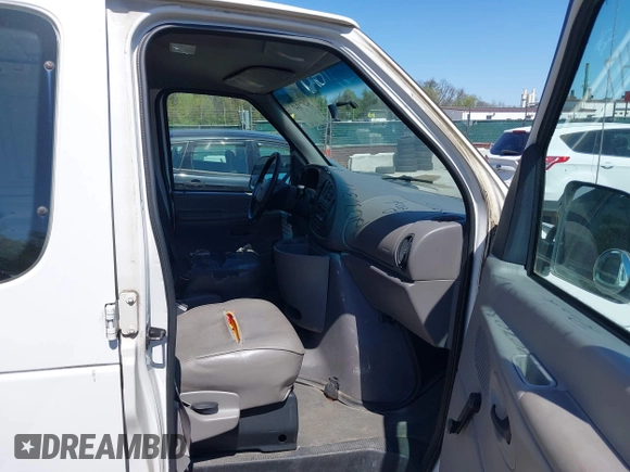 1999 Ford Econoline Cargo with VIN 1FTRE1421XHB21609, listed as a IAAI auction lot 42070347 with 103,104 mi miles. Bid and sale history available at carsss.com. Image 5.