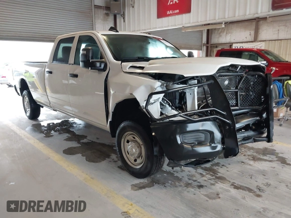 2023 Ram 2500 Tradesman z VIN 3C6UR5HJ0PG610057, wystawiony jako IAAI lot #42385008 z przebiegiem 21 105 mil mil oraz . Historia ofert i sprzedaży dostępna na DreamBid. Obrazek 1.