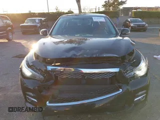 2015 Infiniti Q50 Premium z VIN JN1BV7AP5FM346323, wystawiony jako IAAI lot #41305093 z przebiegiem 112 556 mil mil oraz . Historia ofert i sprzedaży dostępna na DreamBid. Obrazek 12.