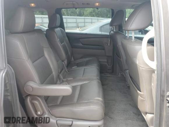 2012 Honda Odyssey Touring with VIN 5FNRL5H94CB102177, listed as a Copart auction lot 55942185 with 179,418 mi miles and Salvage Title. Bid and sale history available at DreamBid. Image 11.