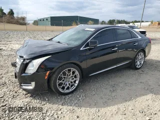 2014 Cadillac XTS Platinum z VIN 2G61T5S3XE9209049, wystawiony jako Copart lot #42940515 z przebiegiem 199 639 mil mil oraz Szkoda całkowita • Salvage title. Historia ofert i sprzedaży dostępna na DreamBid. Obrazek 1.