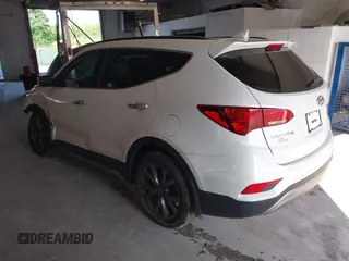 2017 Hyundai Santa Fe Ultimate with VIN 5XYZWDLA2HG491338, listed as a IAAI auction lot 42590671 with 114,521 mi miles and . Bid and sale history available at DreamBid. Image 3.