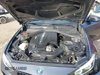 2018 BMW M2 with VIN WBS1J5C50JVE51869, listed as a IAAI auction lot 41814404 with 69,684 mi miles. Bid and sale history available at carsss.com. Image 10.