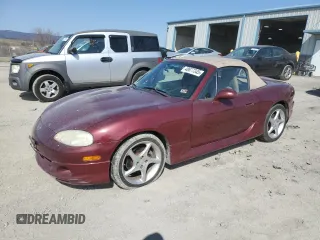 2003 Mazda MX-5 Miata Cloth with VIN JM1NB353530301002, listed as a Copart auction lot 48677345 with 143,460 mi miles and Clean Title. Bid and sale history available at DreamBid. Image 1.