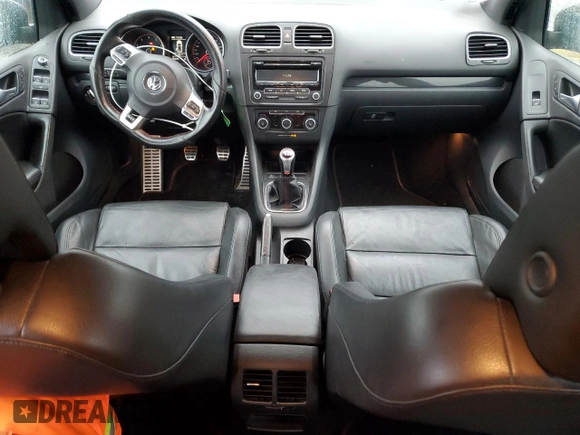 2013 Volkswagen GTI с VIN WVWGD7AJ3DW141277, выставлен на аукционе Copart как лот 51529385 с пробегом 75 137 миль миль и Списание • Salvage title. История ставок и продаж доступна на DreamBid. Изображение 8.
