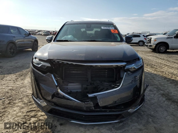2021 Cadillac XT6 Premium Luxury z VIN 1GYKPCRS6MZ205831, wystawiony jako Copart lot #47259215 z przebiegiem 31 959 mil mil oraz Szkody całkowita. Historia ofert i sprzedaży dostępna na DreamBid. Obrazek 5.