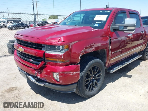 2017 Chevrolet Silverado 1500 LT with VIN 3GCUKREC4HG164281, listed as a IAAI auction lot 42037712 with 133,935 mi miles and . Bid and sale history available at DreamBid. Image 6.