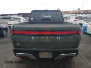 2022 Rivian R1T Launch Edition z VIN 7FCTGAAL0NN001256, wystawiony jako Copart lot #55850845 z przebiegiem 49 236 mil mil oraz Szkoda całkowita • Salvage title. Historia ofert i sprzedaży dostępna na DreamBid. Obrazek 6.