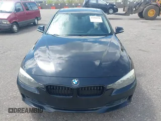 2014 BMW 3 Series 328i xDrive with VIN WBA3B3C56EJ981322, listed as a IAAI auction lot 42104530 with 104,376 mi miles. Bid and sale history available at carsss.com. Image 12.