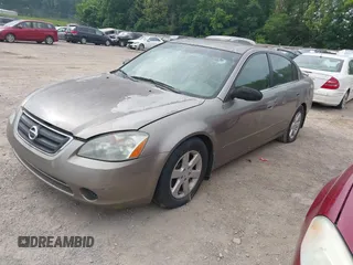 2002 Nissan Altima SL z VIN 1N4AL11D42C286462, wystawiony jako IAAI lot #42442458 z przebiegiem 142 053 mil mil oraz . Historia ofert i sprzedaży dostępna na DreamBid. Obrazek 2.