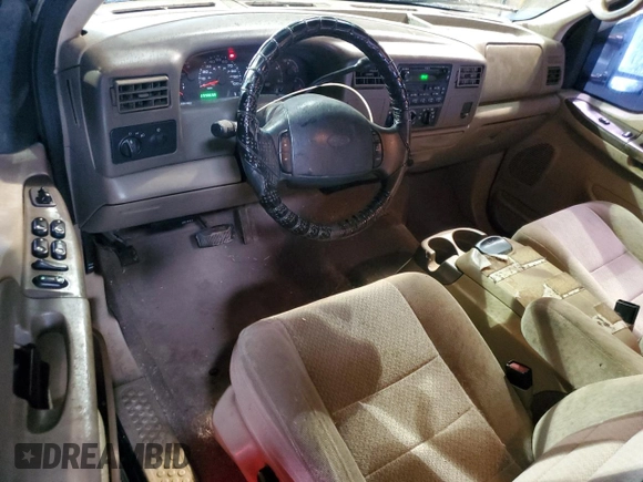 2002 Ford F-250 XL with VIN 1FTNW20F52EA52699, listed as a Copart auction lot 84088814 with 299,869 mi miles and Salvage Title. Bid and sale history available at DreamBid. Image 8.
