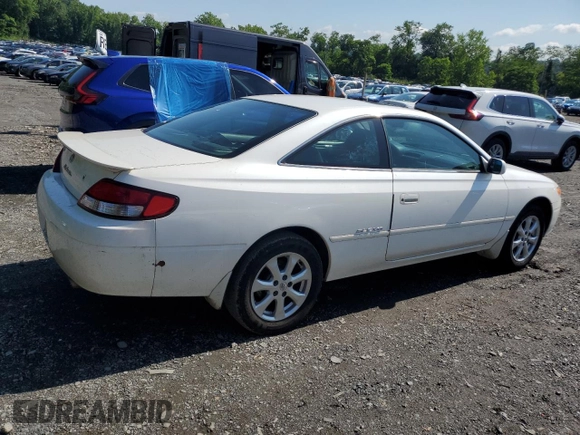 2000 Toyota Solara SE z VIN 2T1CF28P2YC378976, wystawiony jako Copart lot #61400195 z przebiegiem 197 090 mil mil oraz Czysty tytuł • Clean title. Historia ofert i sprzedaży dostępna na DreamBid. Obrazek 3.