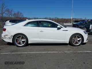 2019 Audi A5 Premium z VIN WAUSNAF53KA026928, wystawiony jako IAAI lot #41834053 z przebiegiem 78 282 mil mil oraz . Historia ofert i sprzedaży dostępna na DreamBid. Obrazek 13.